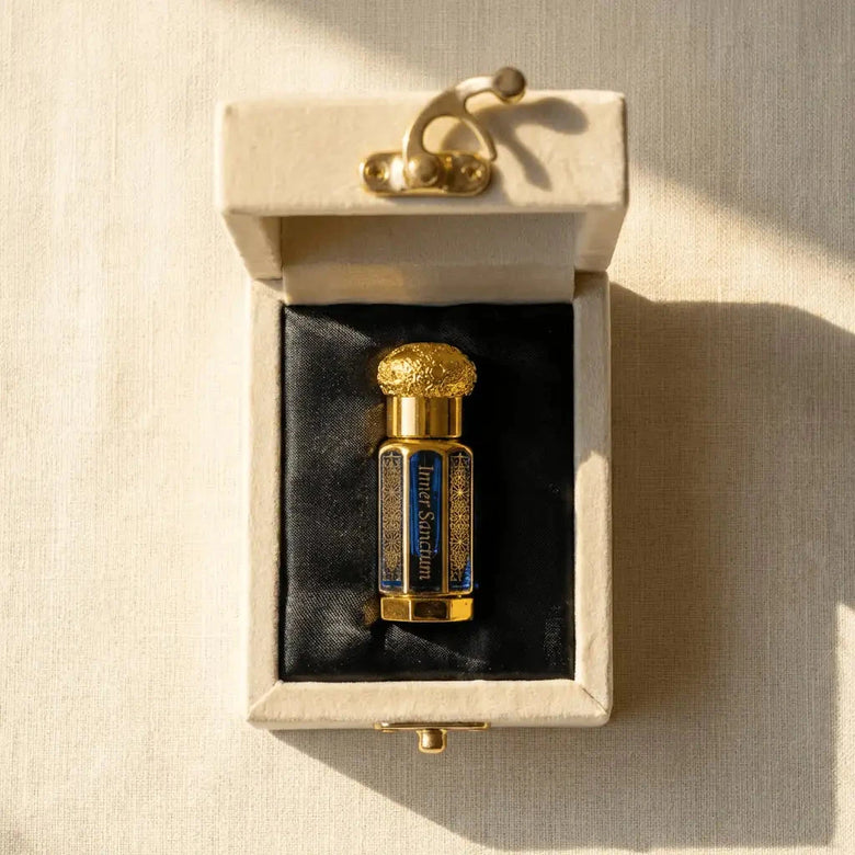 Inner Sanctum, the gold and glass bottle resting in its velvet box